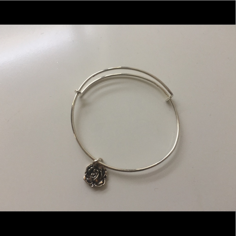 Sterling silver charm bracelet with rose charm